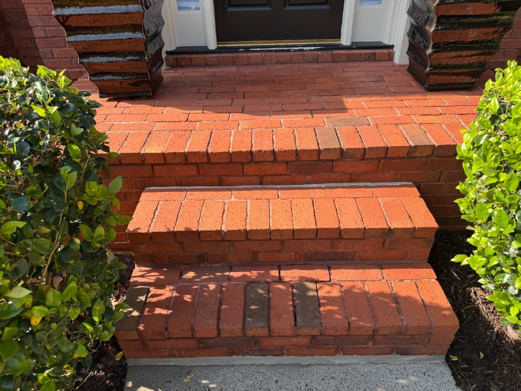 After brick and paver wash: brighter pavers and steps with grime removed