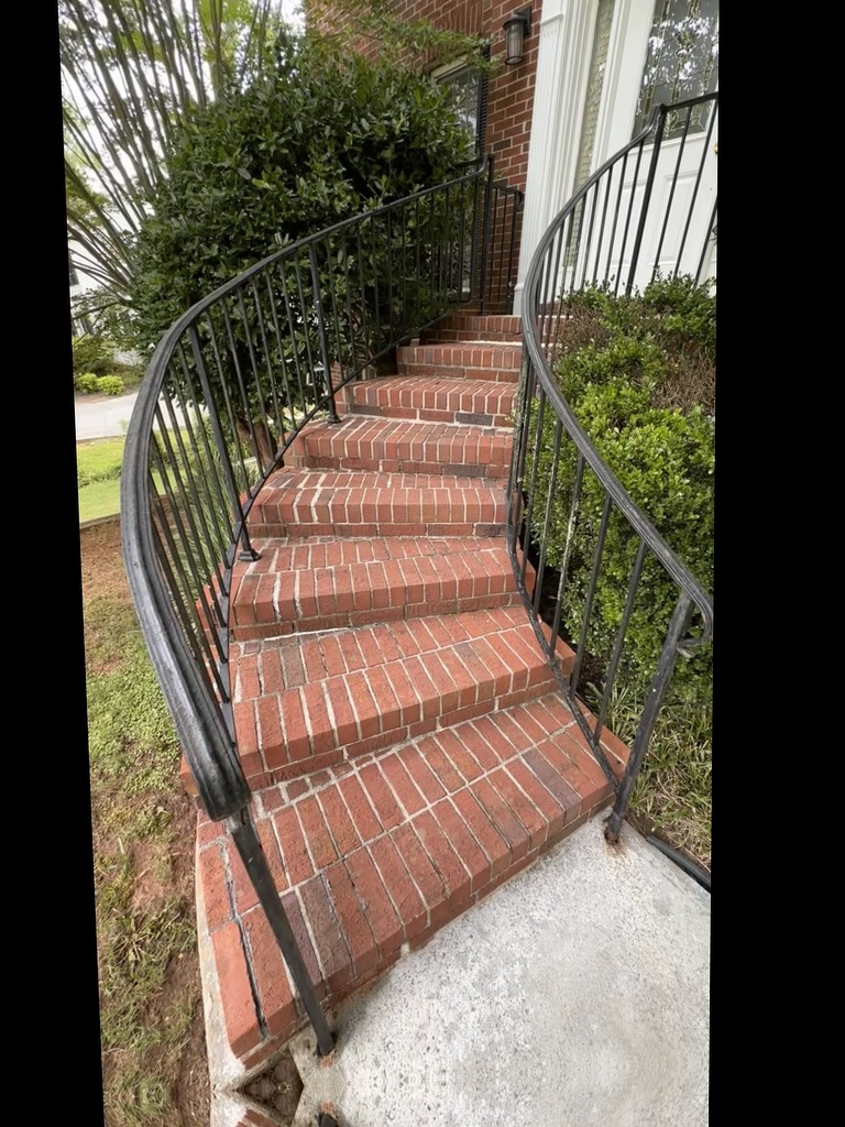 Before soft wash at Spain Road: algae and grime on exterior surfaces