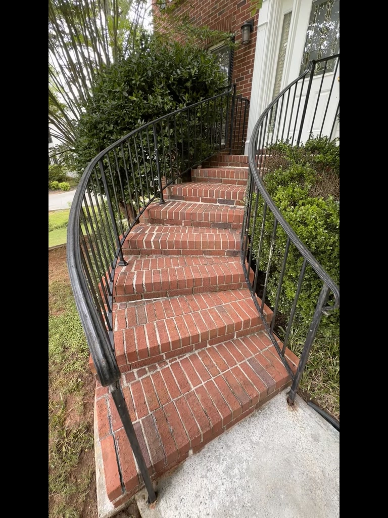 Before soft wash at Spain Road: algae and grime on exterior surfaces